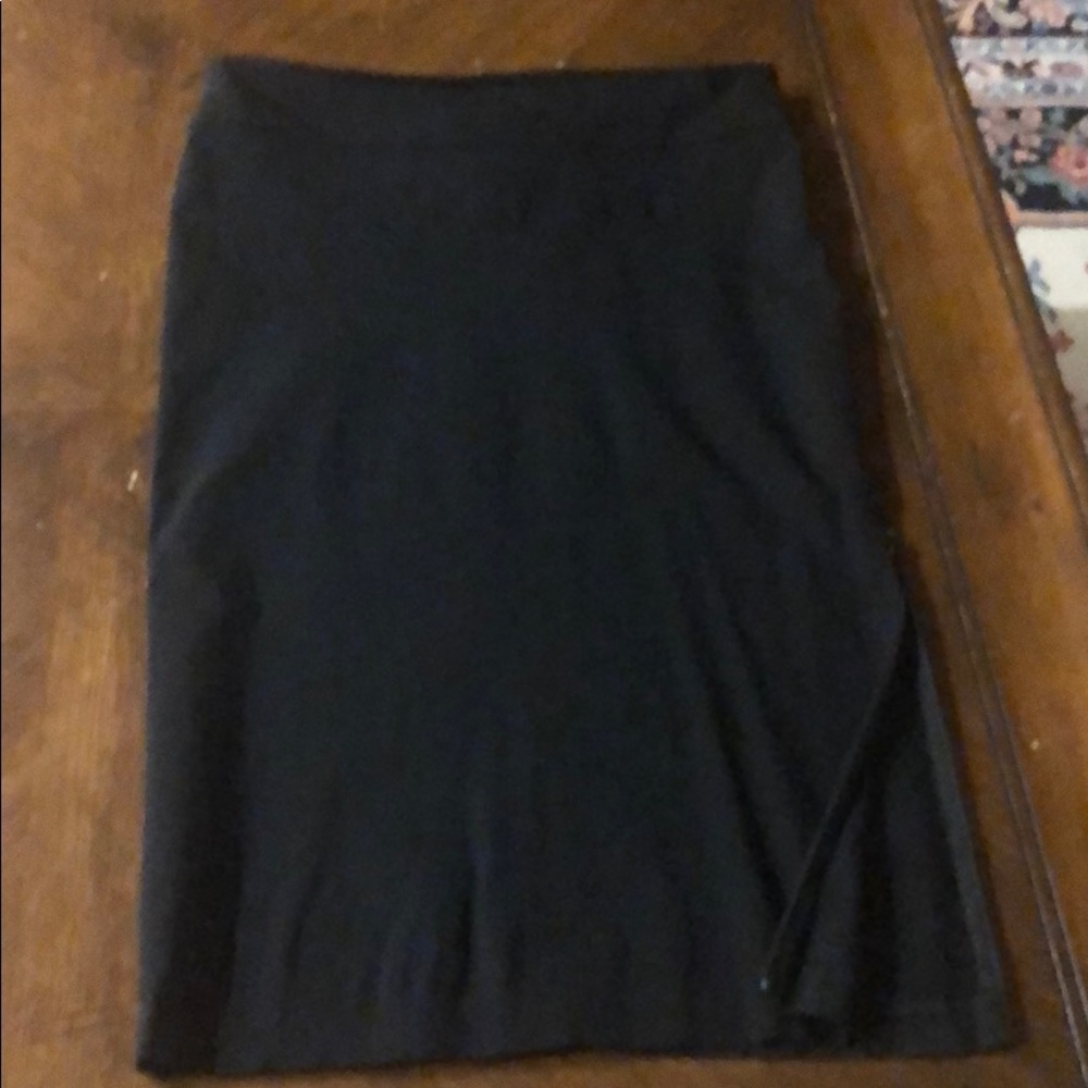 Black tight skirt with slit on the side